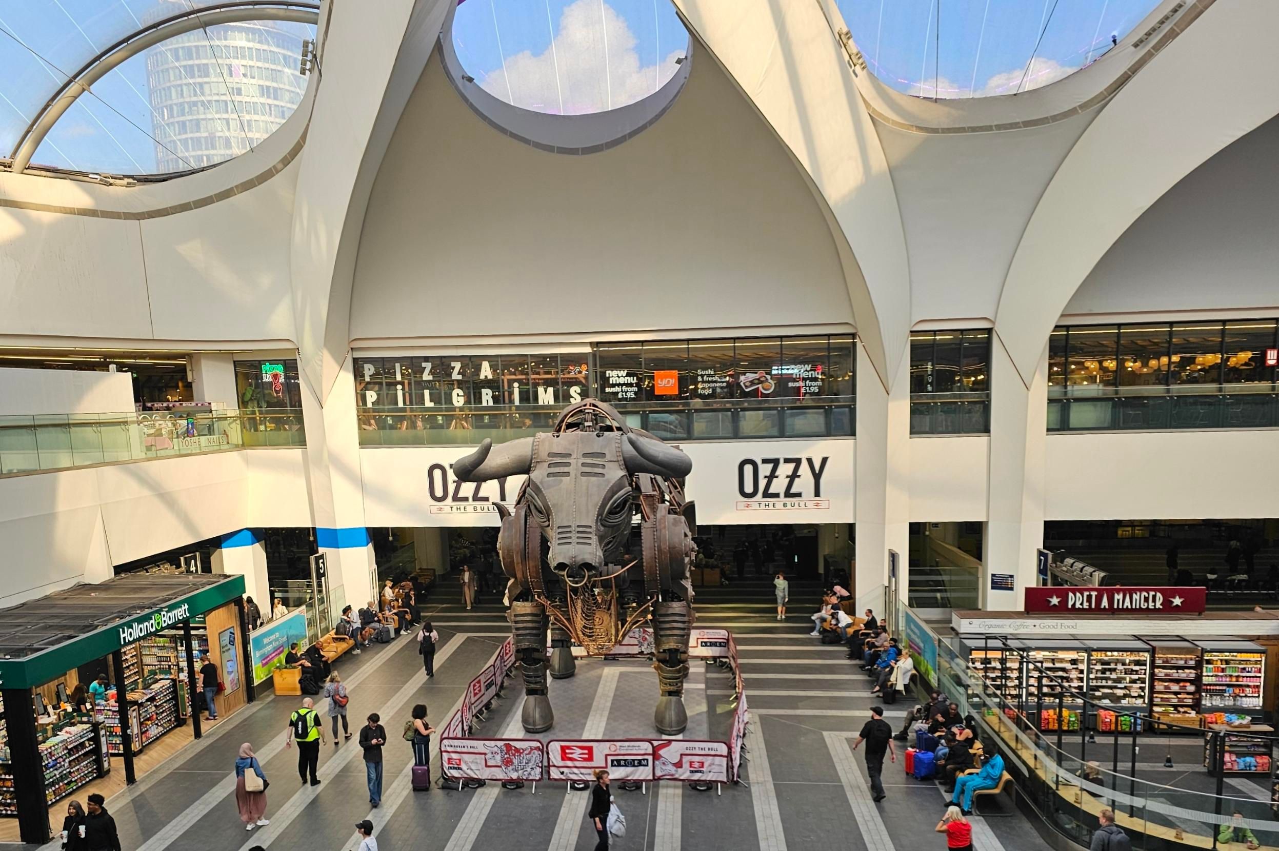 Birmingham New Street station, with the Ozzy the Bull sculpture, on the way to the Sustainable Finance Forum